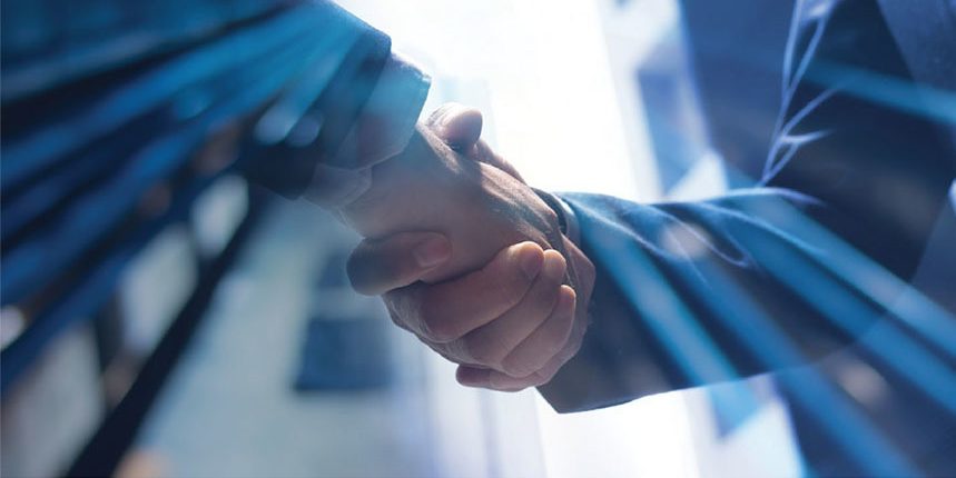 two business people shaking hands