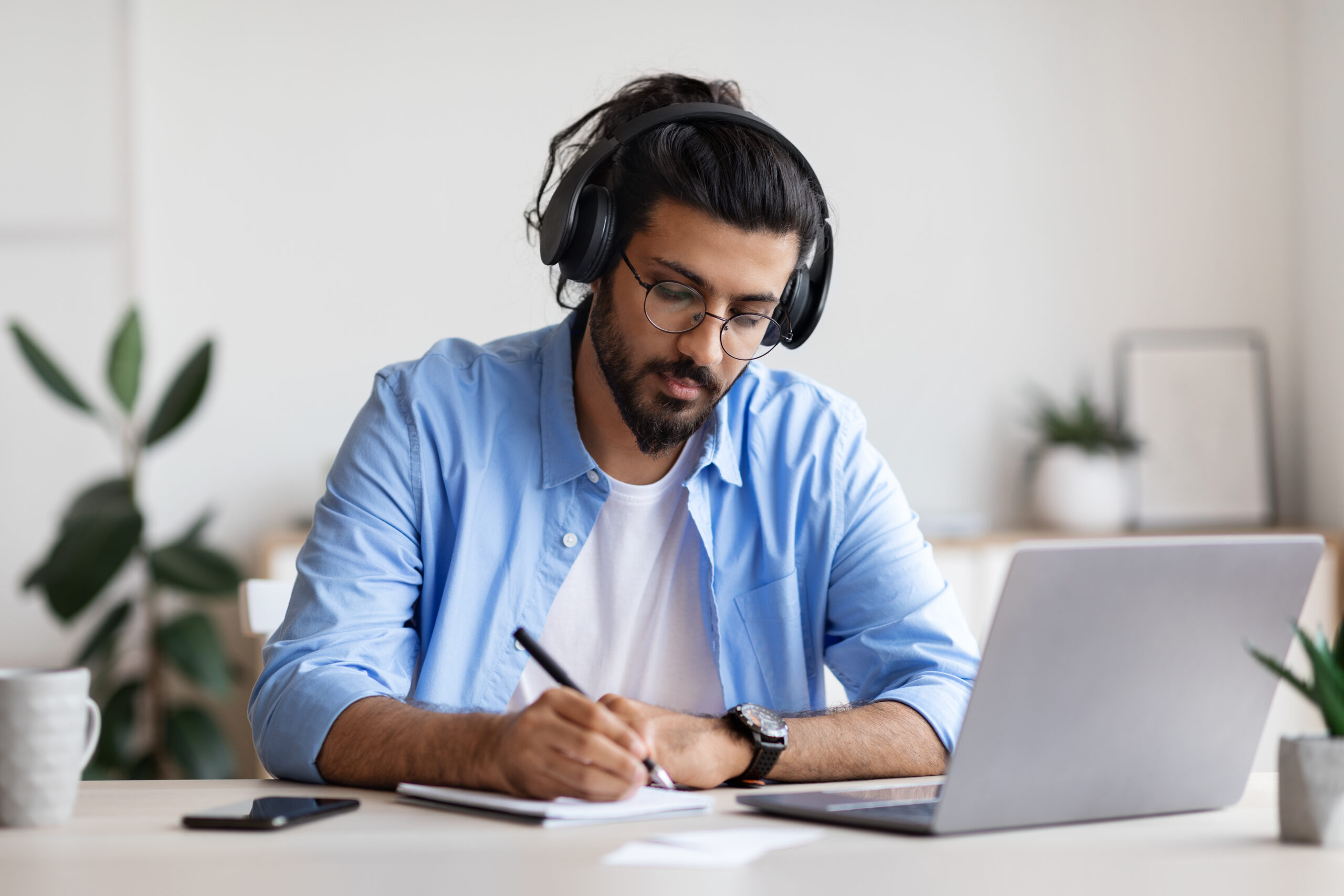 Man studying in front of a computer